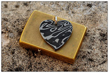 Stainless Damascus and Mokume Heart Pendants